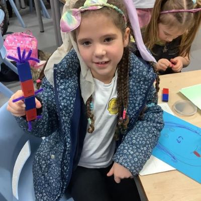 We explored how the metal in paperclips and pipe cleaners are attracted to magnets!