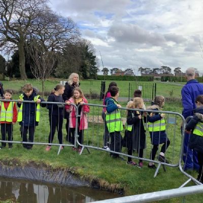 Gardening club walked to the cemetery and met David and Katie from the council.